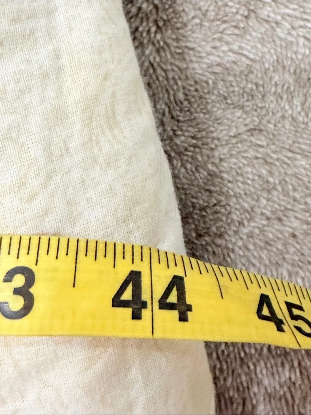 Hand crafted patchwork quilt with tan border